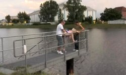 Two lucky men are fucking an amateur slut in public place