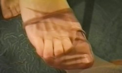 Elegant secretary really enjoys Nylon Fetish in the office