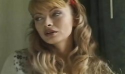 Playful Nylon Fetish lady reveals her goods in close-up