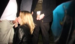 British slut in leather jacket is sucking on a dogging mission