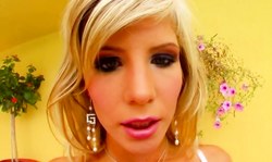 Doll with Big Tits and shaved pussy poses naked in close-up