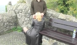 Shameless amateur in black stockings sucks outdoors