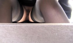 First-class retro glamour doll poses fully naked by the forest