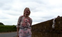 Beauty blonde is flashing her naked pussy by the road