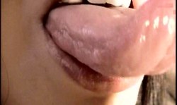 Elegant tongue fetish solo performed by hot amateur chick