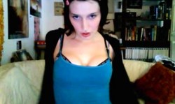 Brunette with bright blue eyes likes tongue fetish and solo webcam chats