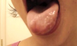 Gorgeous-looking amateur brunette nicely shows her huge tongue