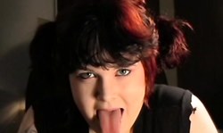 Green-eyed amateur chick demonstrates her sweet long tongue
