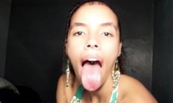 Incredibly sexy ebony with full lips and long tongue in solo action