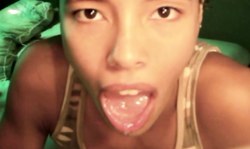 Gorgeous amateur ebony is licking her lollipop and playing with a tongue