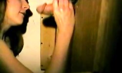 Young amateur slut sucks and swallows in her first gloryhole