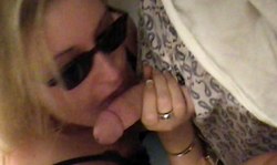 Cutie in sunglasses sucks two hard dicks just to get a double facial