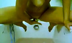 Fit cam girl with massive boobs masturbates in the shower