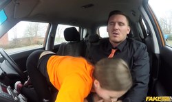 Astonishing teacher gives a blowjob at Fake Driving School