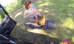 Alluring outdoor lesbian sex with a big-boobed blonde driver