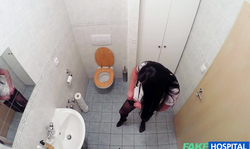 Sexy young brunette is sucking doctor's massive dick in the office