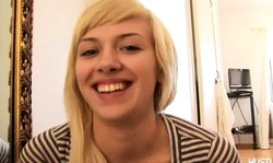 Cutest blonde teen demonstrates her massive natural boobs