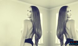 Two very gorgeous brunettes flirting with the camera