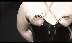 Master nicely bonded and stimulated her tits in a classic BDSM way