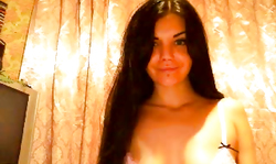 Awesome-looking brunette is touching her little snatch