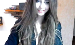 Smiling slim girl gets naked and plays with her shaved pussy