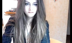 Very hot teenager shows off her black strings and red bra