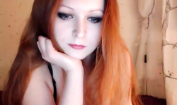 Cute-looking redhead beauty enjoys posing so freaking much