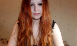 Impressive redhead beauty is enjoying her black lingerie