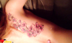 Slender tattooed chick is being pounded hard in the doggy style