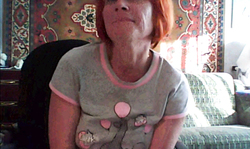 Redhead mom is reveling her massive natural boobs!