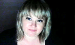 Short-haired milf is posing on the webcam in the video chat