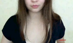 Awesome dark-haired beauty is demonstrating her spicy boobs