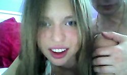 An innocent Russian babe with a sparkling smile poses nude