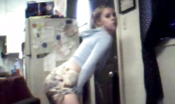 Playful amateur is posing in her sweet colorful miniskirt