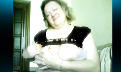 Smiling fat slut is revealing her truly gigantic melons