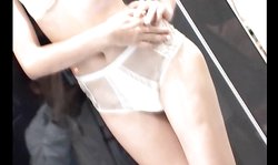 Good-looking oriental hottie presents her sweet long legs