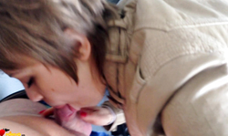 Short-haired chick is giving a head in the public toilet