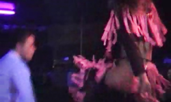 Beautiful Russian girl is dancing on stage and shaking her butts