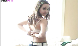 Truly stunning brunette Andi Pink is reading a book in a how way