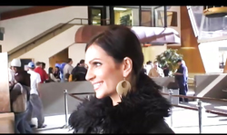 Impressively massive melons of a busty Denise Milani