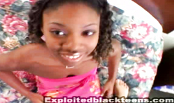 Kinky black whore is swallowing a massive white boner