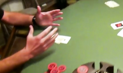 Two leggy beauties are kissing on the black couch and playing with pussies