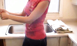 Big-tit blonde milf Shanda Fay goes naked in the kitchen