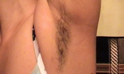 Skinny but sexy bitch is brushing her armpits and pussy