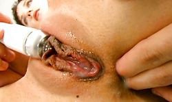 Elegant long-legged brunette stimulates her accurate hole