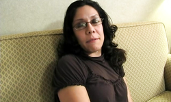 Sexy-looking Joy of Spex brunette is stroking her snatch