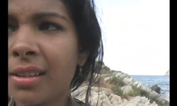 Astonishing dark-haired Karla Spice poses by the sea in a hot way