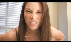 Astonishing brunette poses hot in a sexy brown lingerie