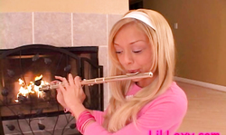 Impressive blonde Lil Lexy pokes her shaved puss with a flute