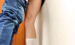 Teenage schoolgirl fucked and creampied standing against the window in empty classroom